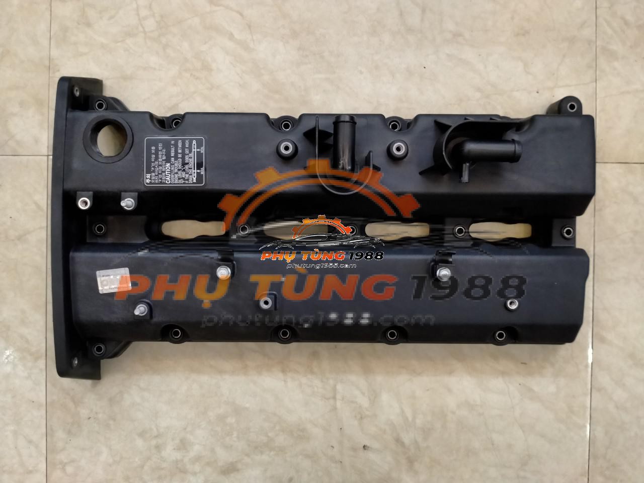 Nắp che dàn cam Kia Bongo III 2006-2009 chính hãng mã 224104X620 Nắp che dàn cam Kia Bongo III 2006-2009 chính hãng mã 224104X620