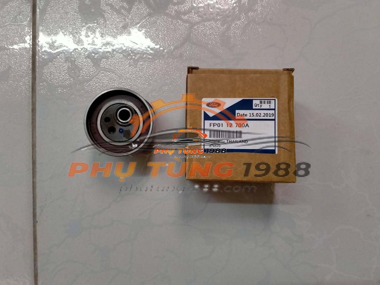 Bi tăng cam Ford Laser chính hãng mã FP0112700A Bi tăng cam Ford Laser chính hãng mã FP0112700A