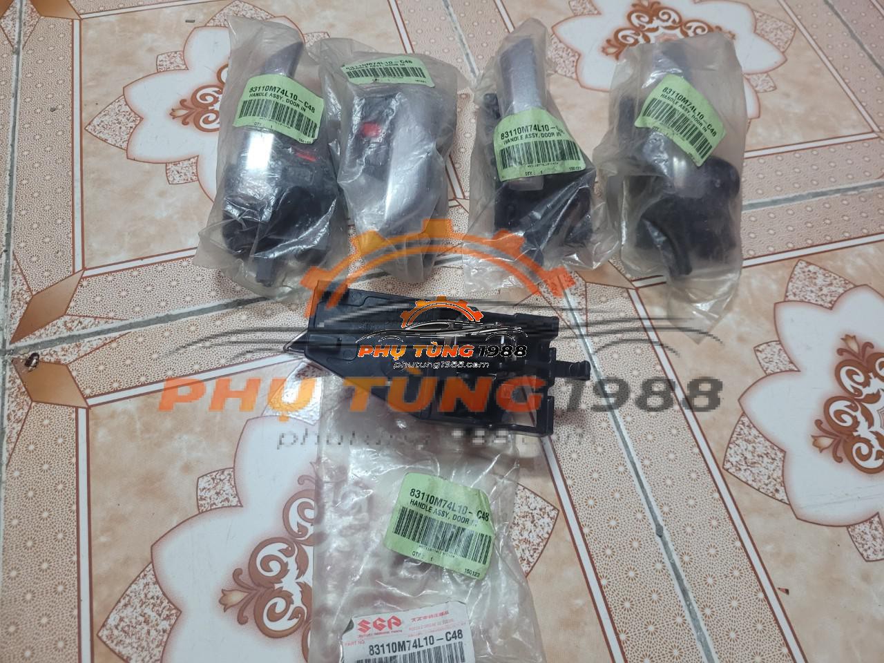Tay mở cửa trong trái Suzuki Ertiga Tay mở cửa trong trái Suzuki Ertiga