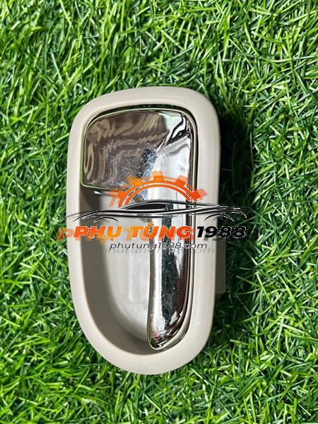 Tay mở trong Ford Laser 1.6 Tay mở trong Ford Laser 1.6