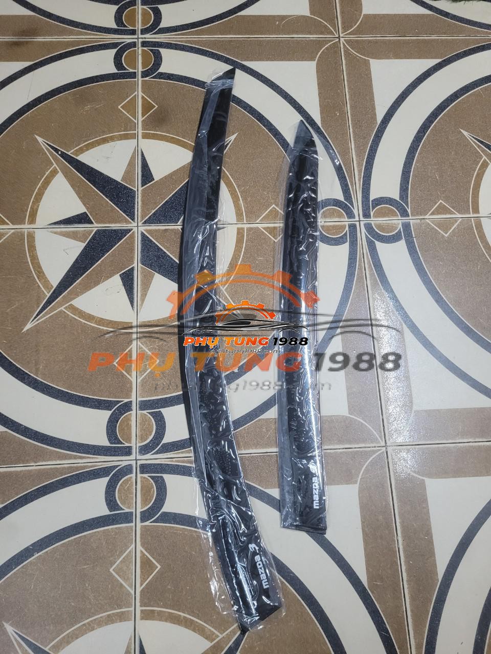 Vè che mưa Mazda3