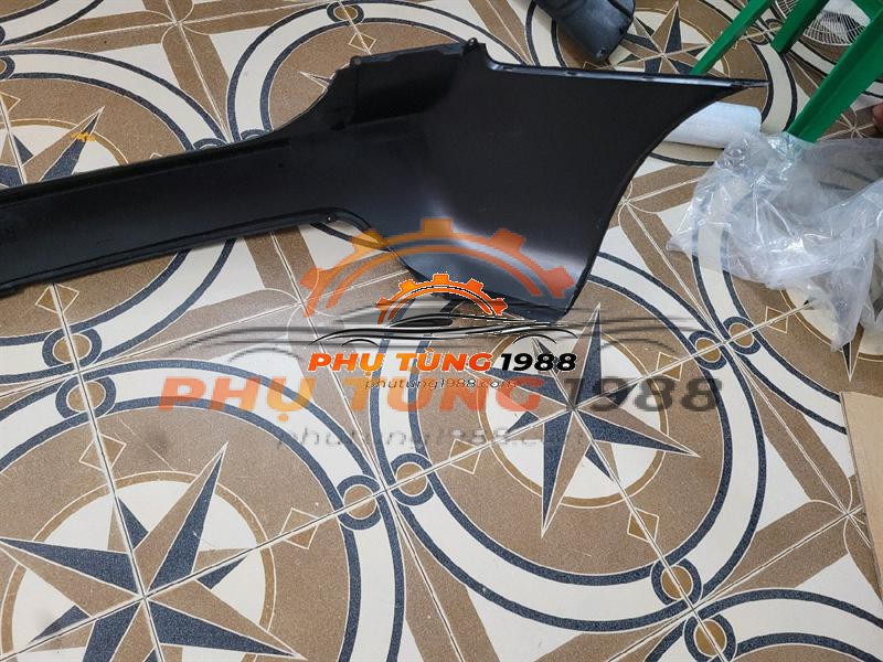 Ba đờ xốc sau Kia Carens